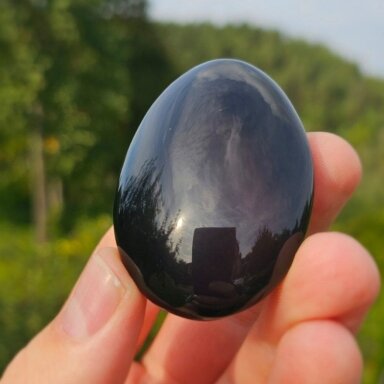 Vaivorykštinio obsidiano delninukas